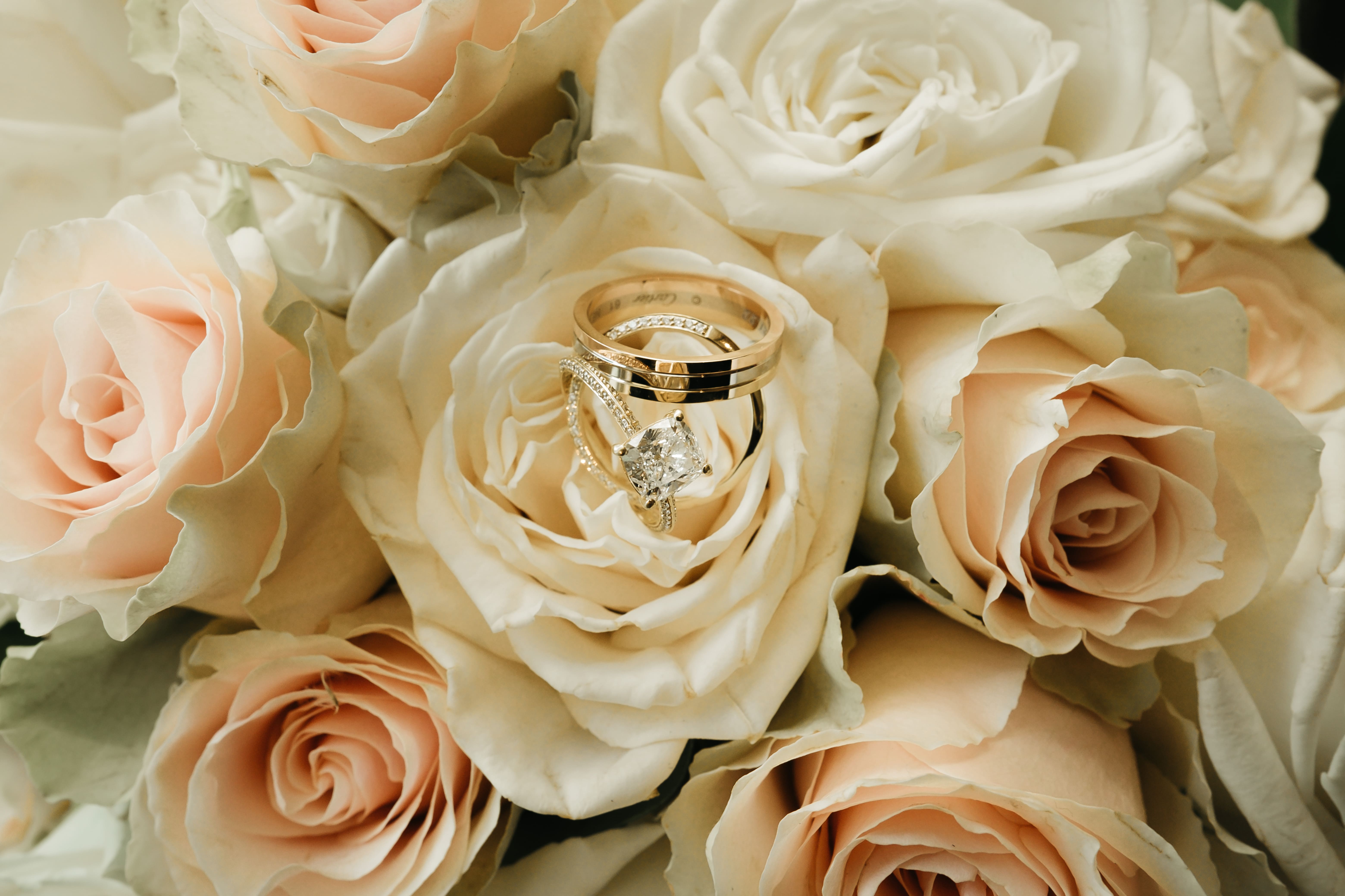 Detailed shot of ivory roses in a bridal bouquet